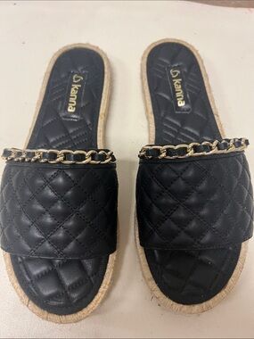 kanna Black Quilted Slide Mules with Gold Chain Trim